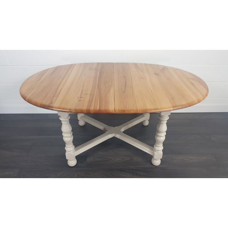 Table vintage ronde peinte pour Ercol en orme et hêtre 1980