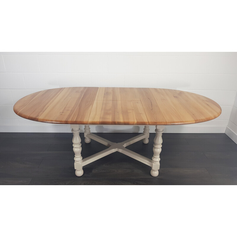 Table vintage ronde peinte pour Ercol en orme et hêtre 1980