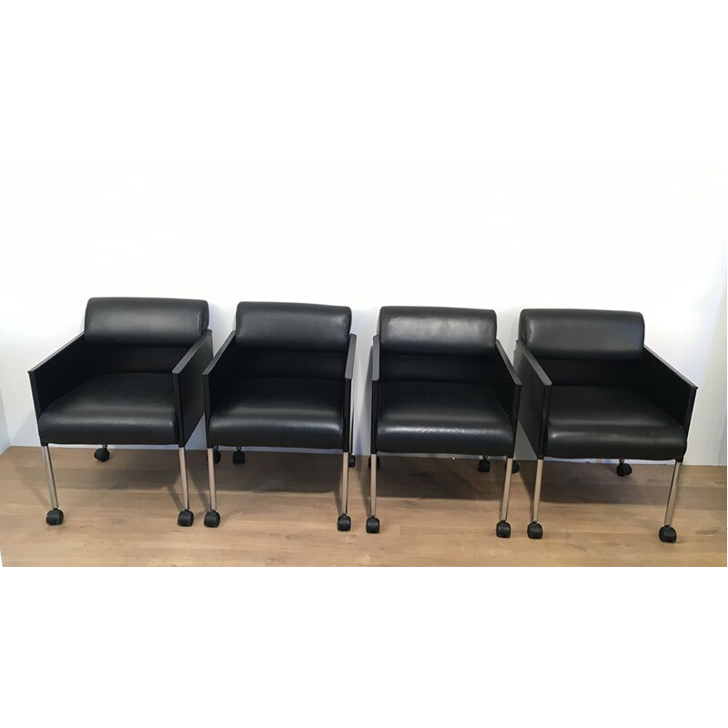 Set of 4 vintage leather armchairs 1970