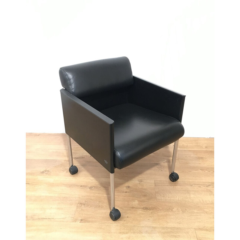Suite de 4 fauteuils vintage en cuir 1970