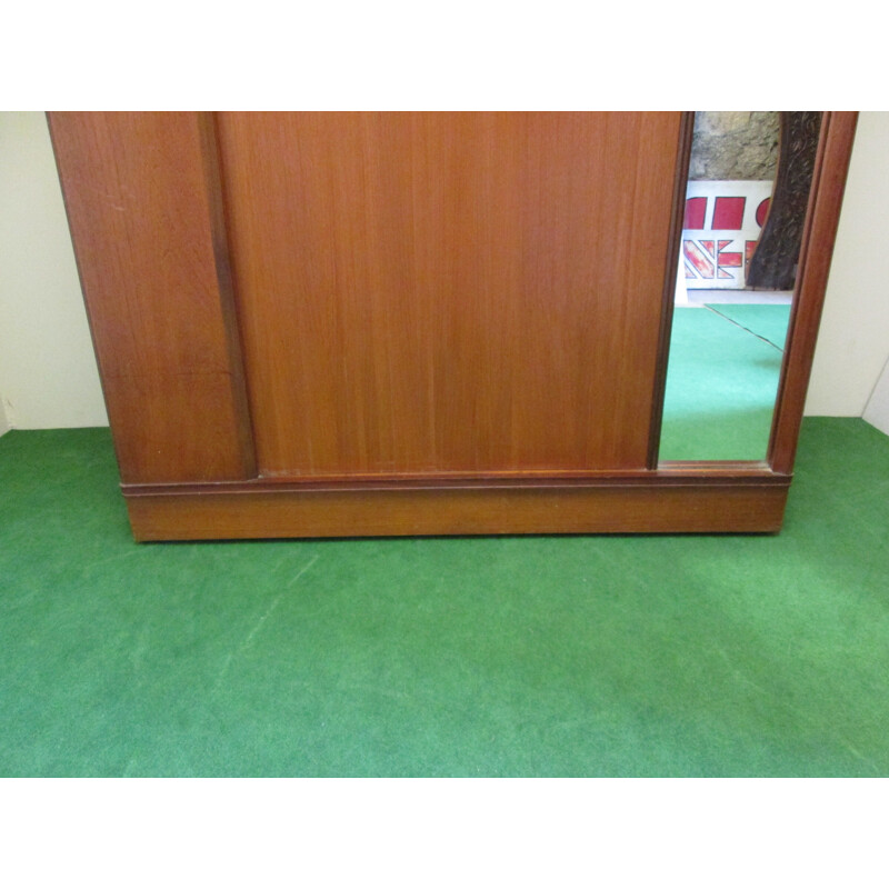 Vintage cabinet in teak with sliding door 1960s 