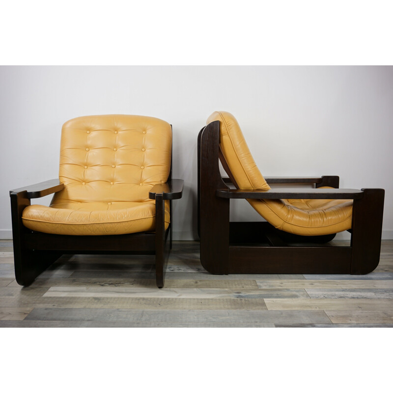 Pair of vintage french armchairs in oak and leather 1960