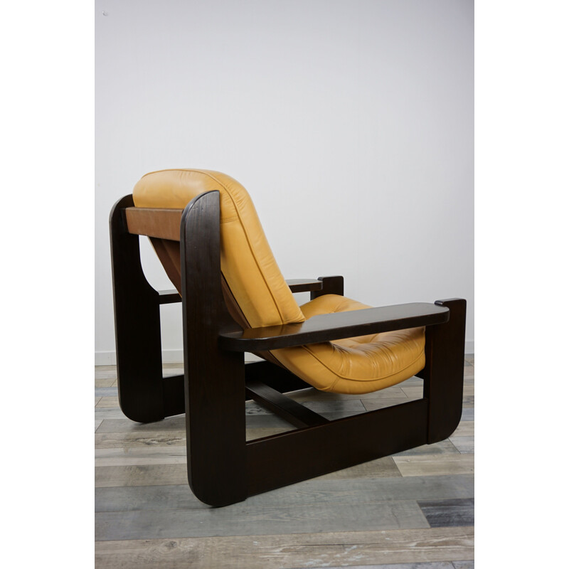 Paire de fauteuils vintage français en chêne et cuir 1960