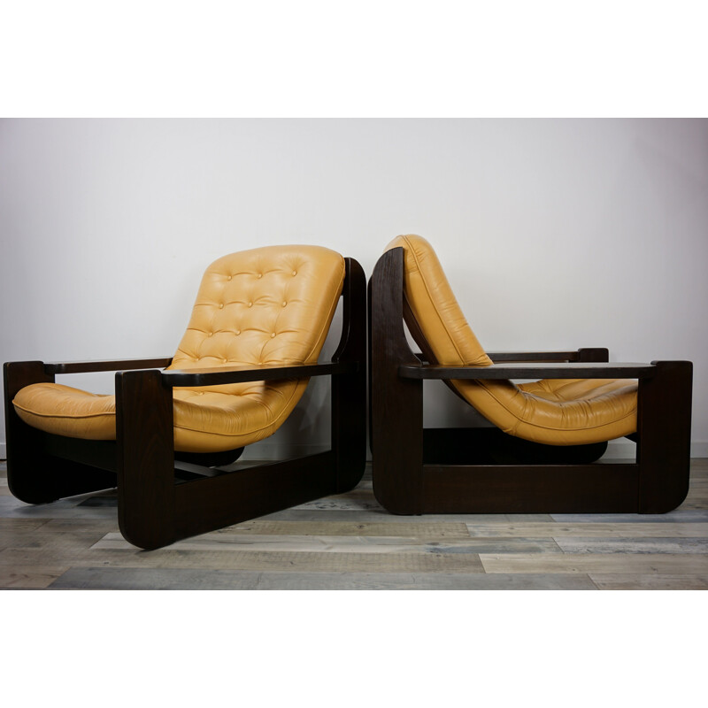 Pair of vintage french armchairs in oak and leather 1960