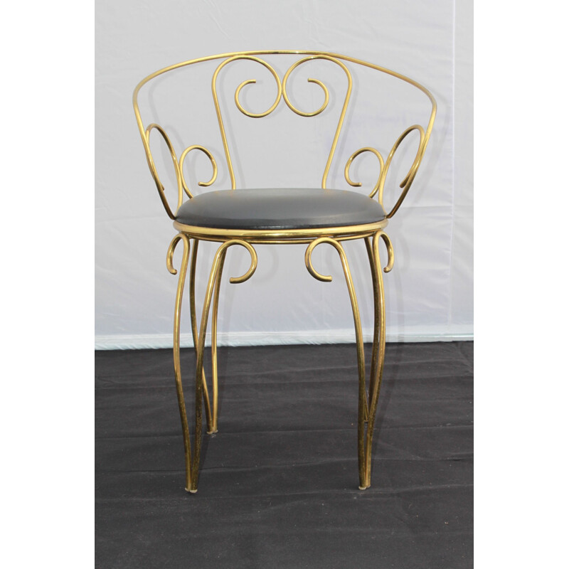 Vintage armchair in brass from the 60s