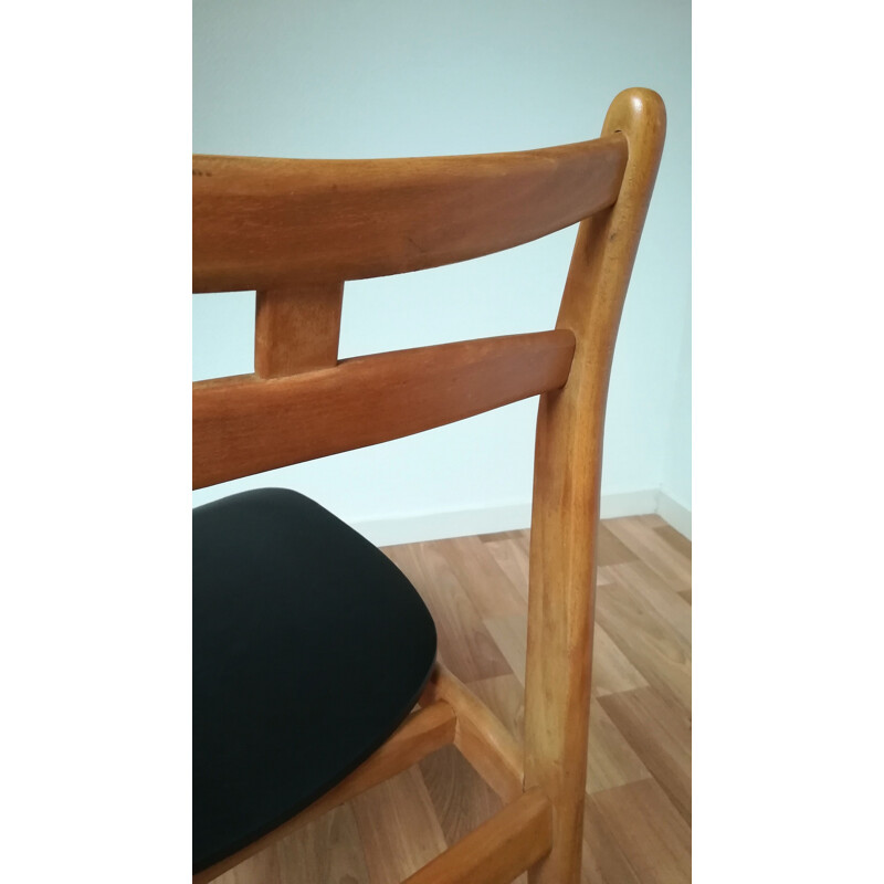 Set of 4 vintage chairs in solid wood and black leatherette 1960