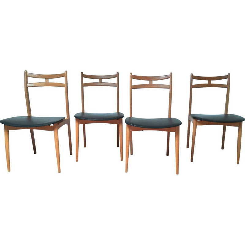 Suite de 4 chaises vintage en bois massif et simili cuir noir 1960