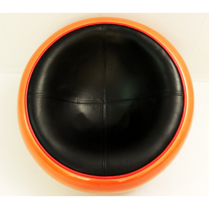 Vintage Egg Pod Ball armchair by Aarnio in orange fiberglass and black leatherette 1960