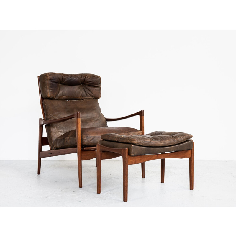 Vintage armchair and ottoman in teak and leather by Ib Kofod Larsen 1960