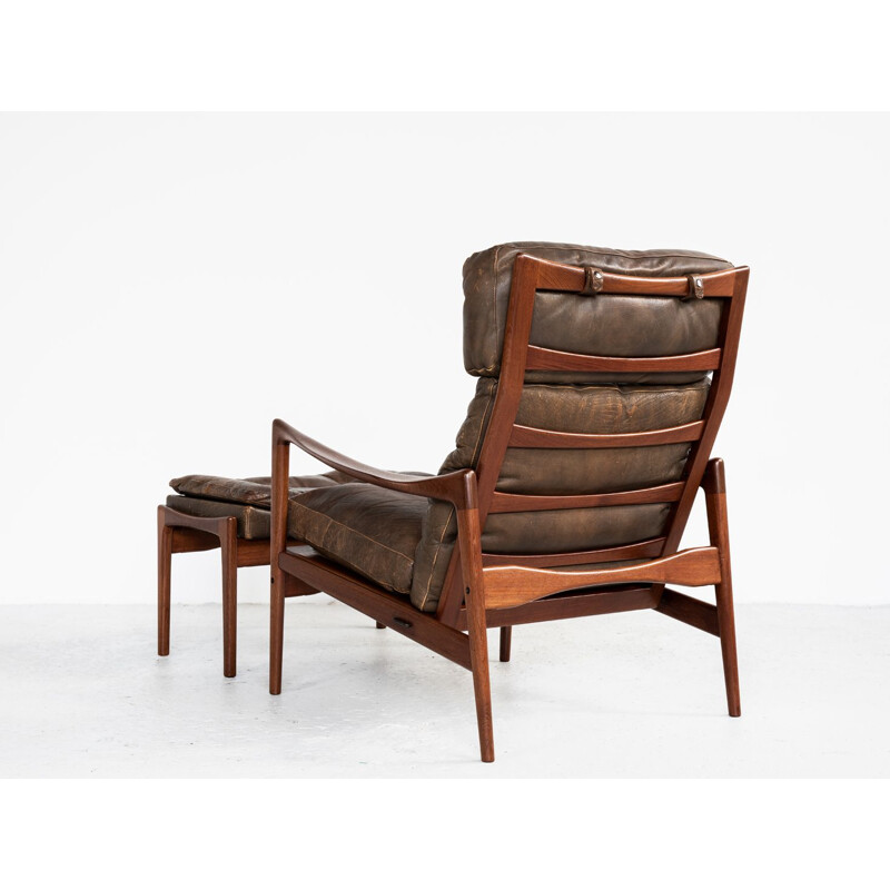 Vintage armchair and ottoman in teak and leather by Ib Kofod Larsen 1960