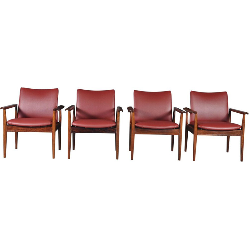 Set of 4 vintage 209 Diplomat chairs for Cado in rosewood and red leatherette 1960s