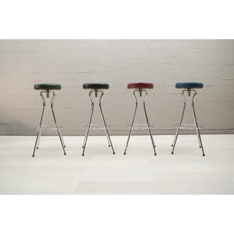 Set of 4 multicolored bar stools in metal