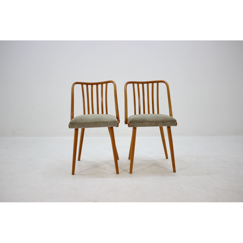 Paar vintage stoelen van hout en stof