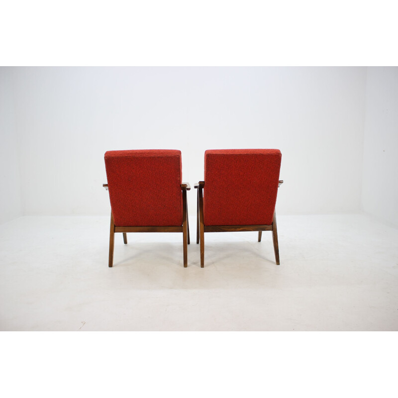 Pair of vintage armchairs in red fabric