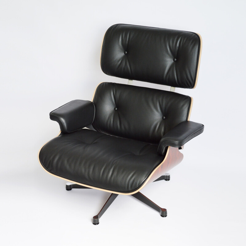 Vintage armchair & ottoman by Eames for vitra 