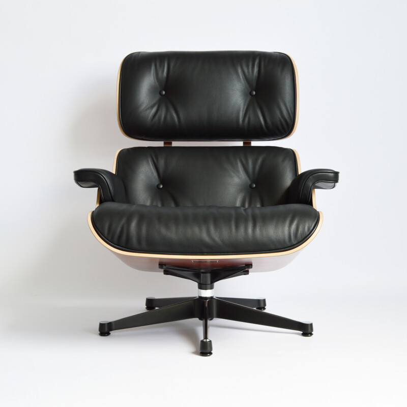 Vintage armchair & ottoman by Eames for vitra 