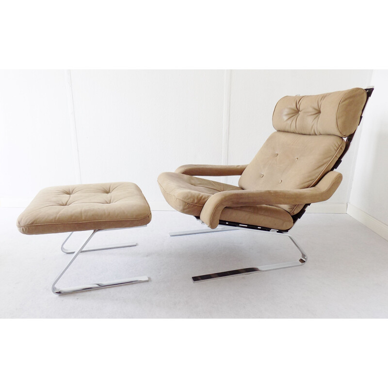 Vintage Danish swivel armchair with ottoman, 1960