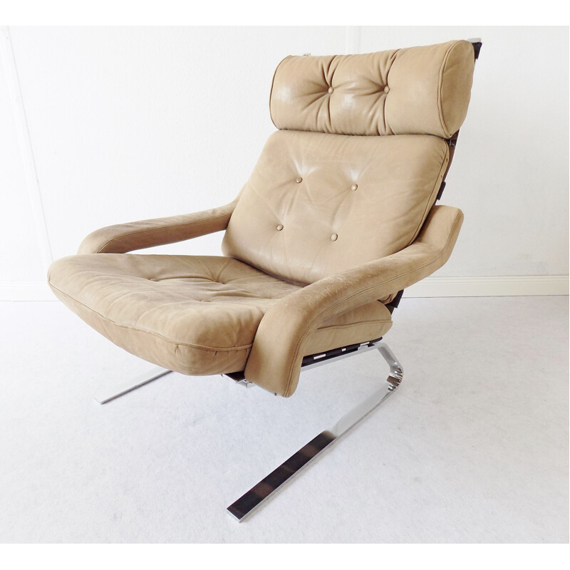 Vintage Danish swivel armchair with ottoman, 1960