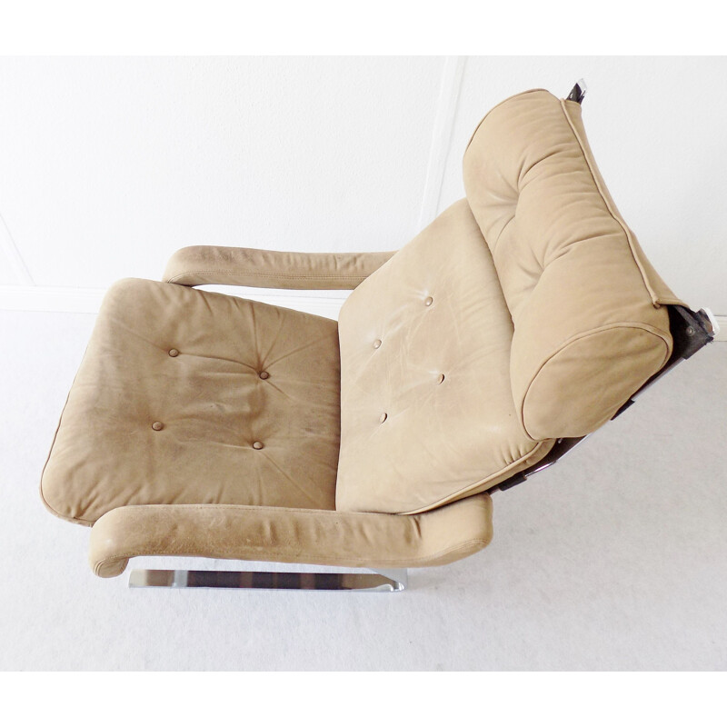 Vintage Danish swivel armchair with ottoman, 1960