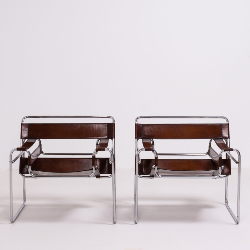 2 chairs in leather and chrome from the 60s