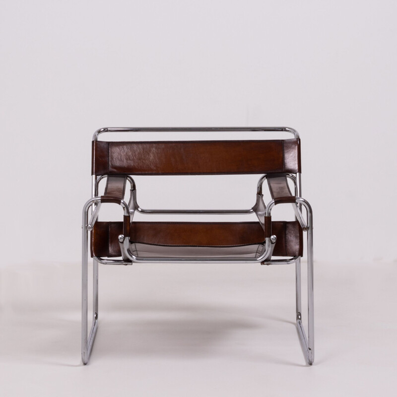 2 chairs in leather and chrome from the 60s