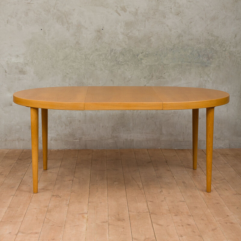 Vintage dining table in oak round extendable by Kai Kristiansen 1960s