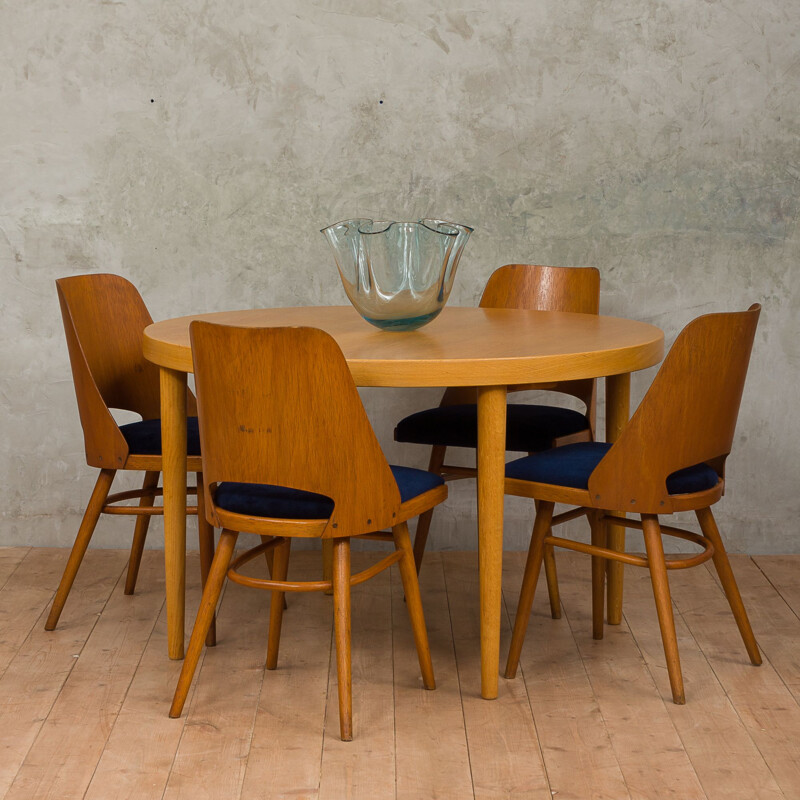 Vintage dining table in oak round extendable by Kai Kristiansen 1960s