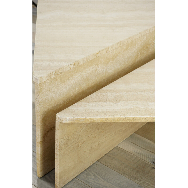 Pair of triangular travertine coffee tables