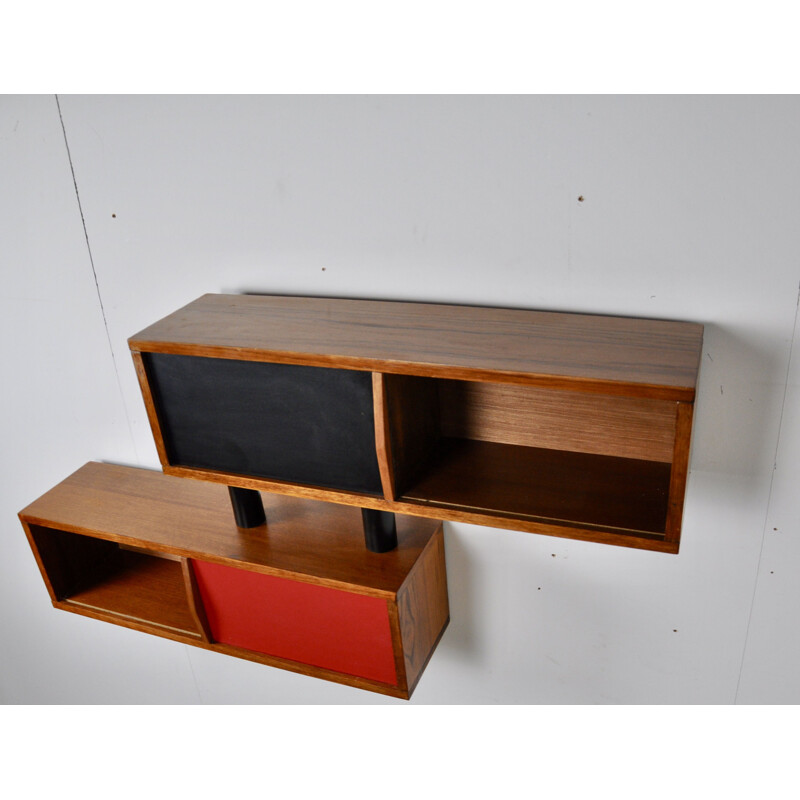 Red and black wall shelves in wood