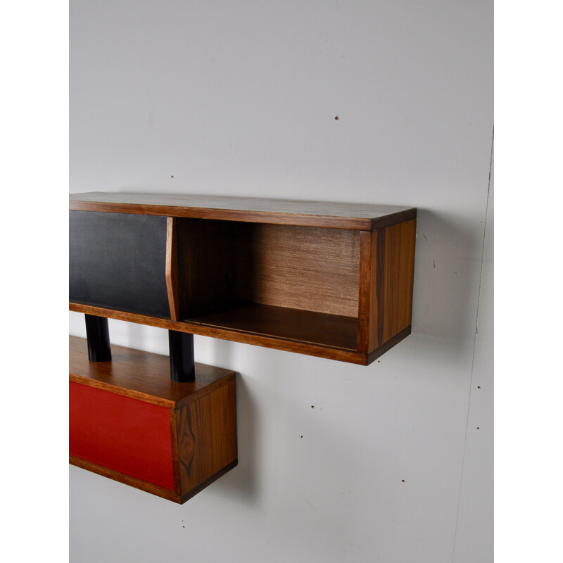 Red and black wall shelves in wood