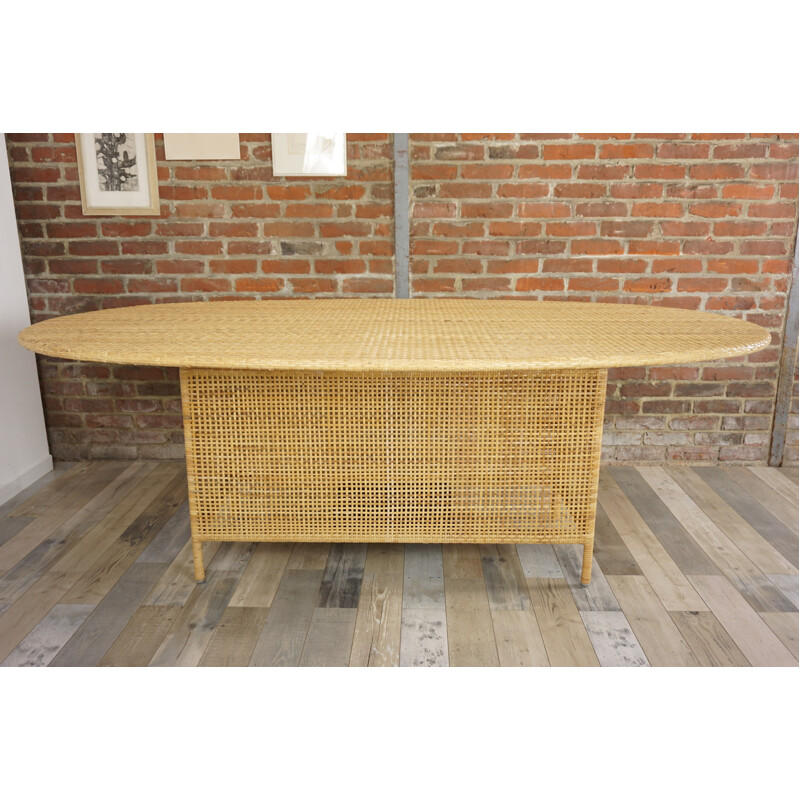 Vintage oval dining table in rattan 