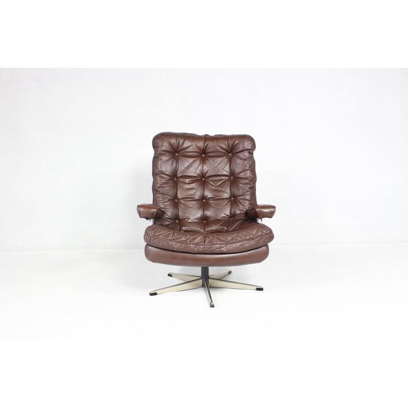 Danish vintage swiveling chair in brown leather