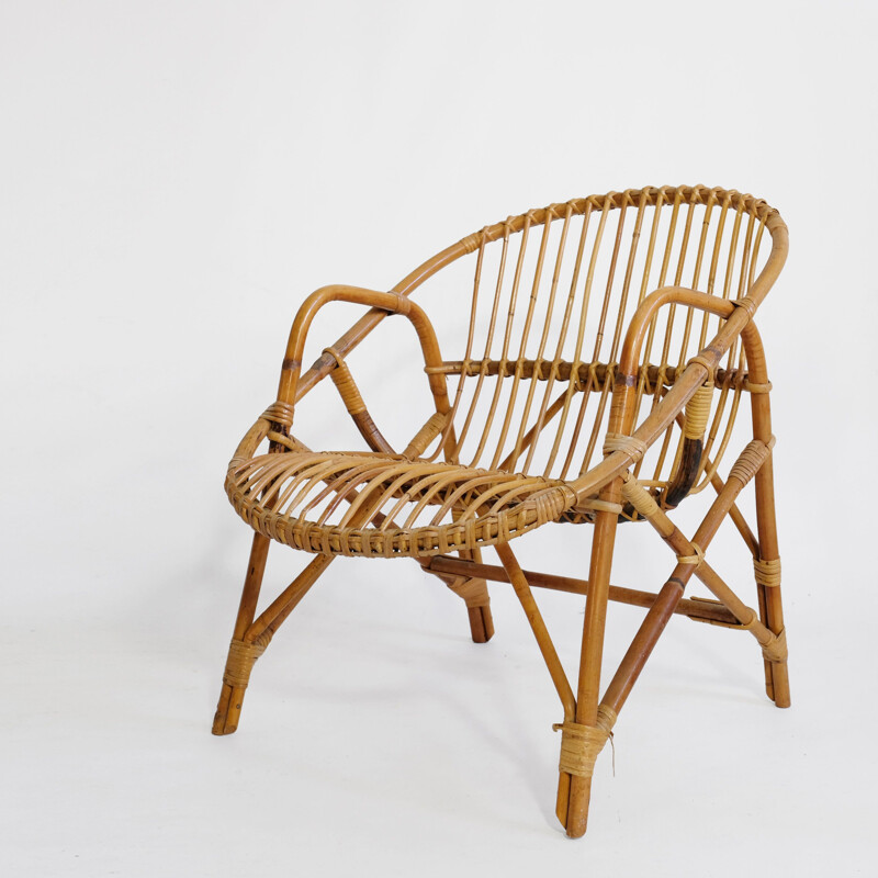 Vintage basket armchair in rattan
