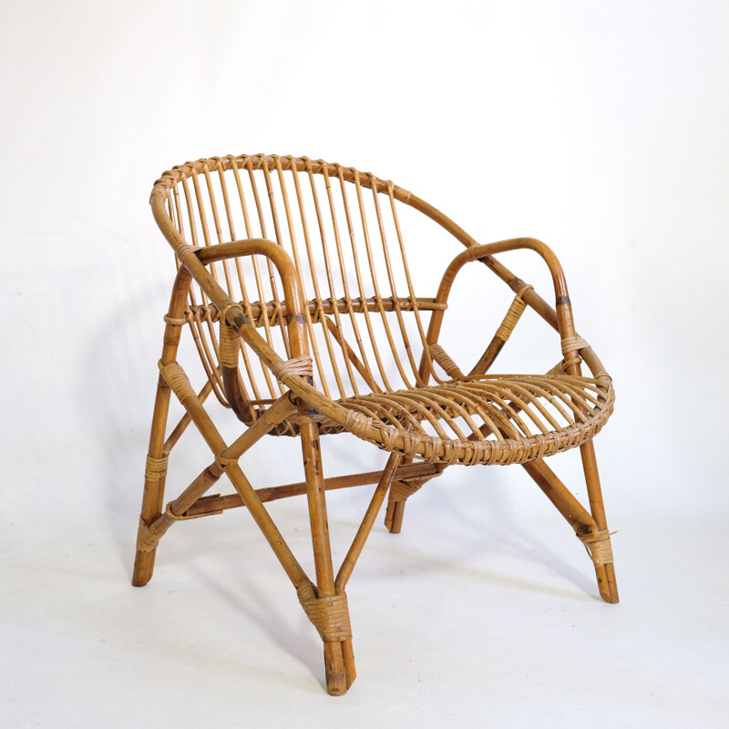 Vintage basket armchair in rattan