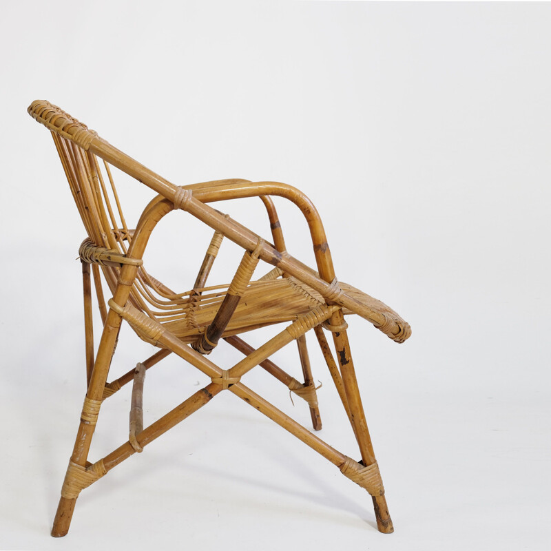 Vintage basket armchair in rattan