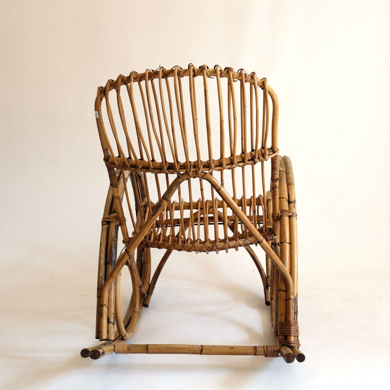 Rocking chair vintage en rotin
