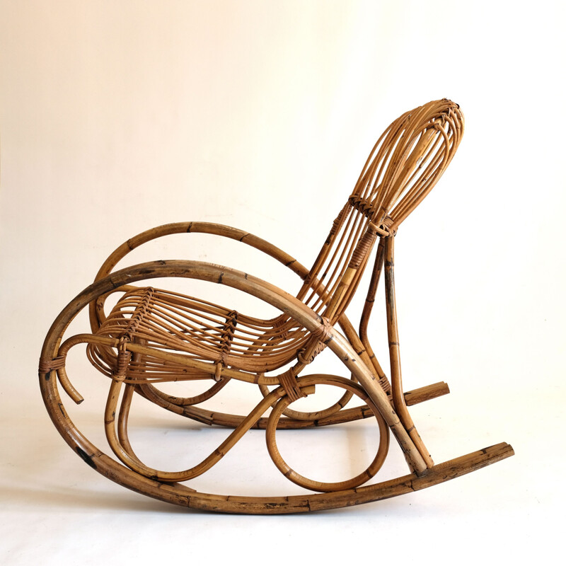 Vintage rocking chair in rattan