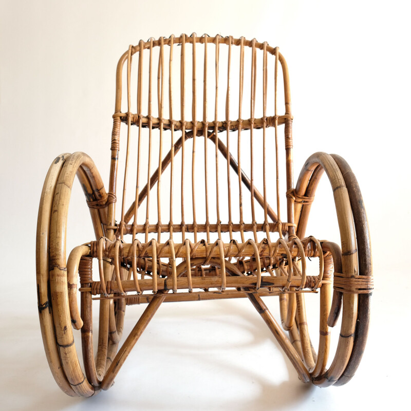 Vintage rocking chair in rattan