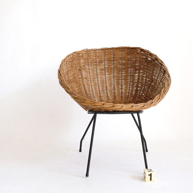 Vintage wicker chair with metal base