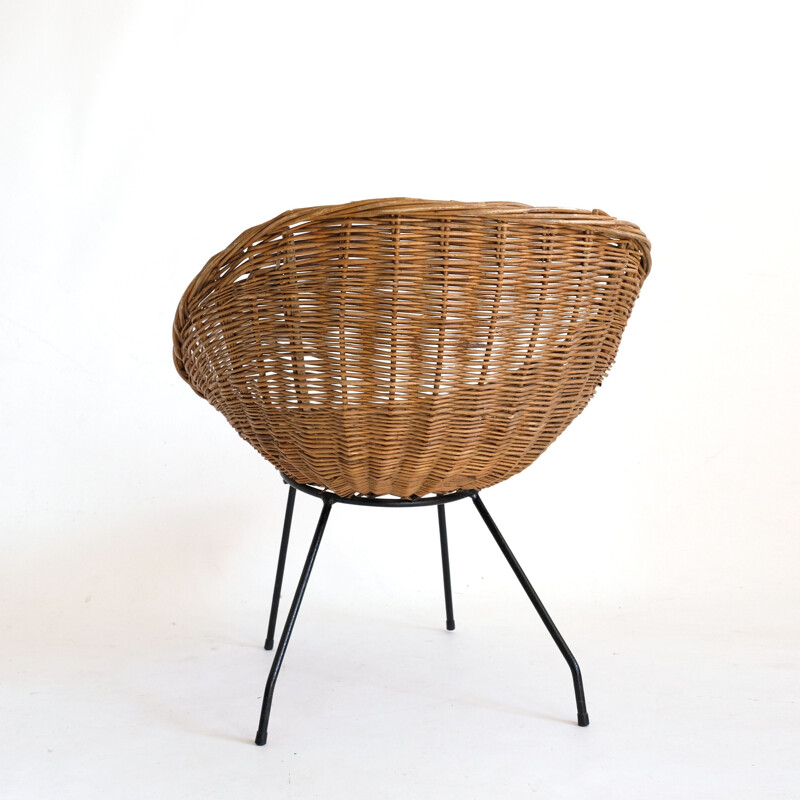 Vintage wicker chair with metal base