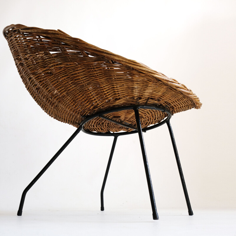 Vintage wicker chair with metal base