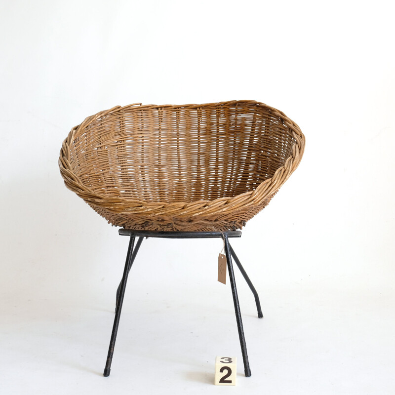 Vintage wicker chair with metal base