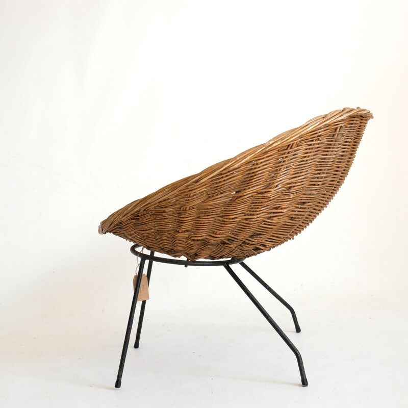 Vintage wicker chair with metal base