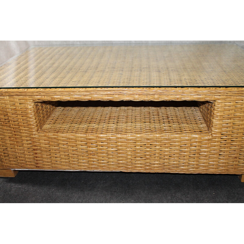 Vintage coffee table made of glass and rattan