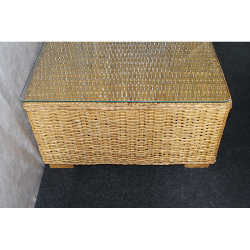 Vintage coffee table made of glass and rattan