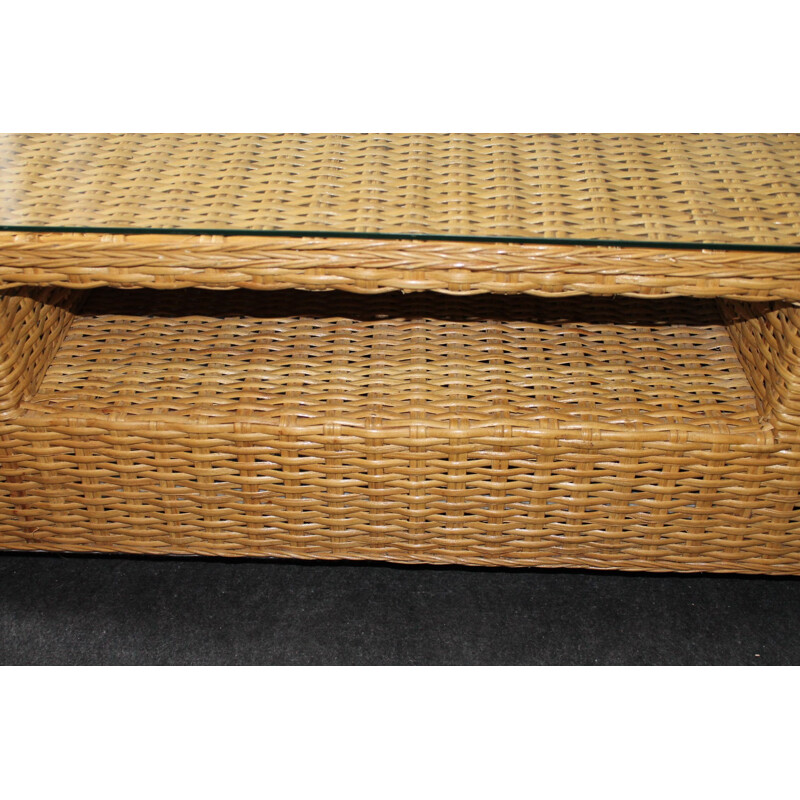 Vintage coffee table made of glass and rattan