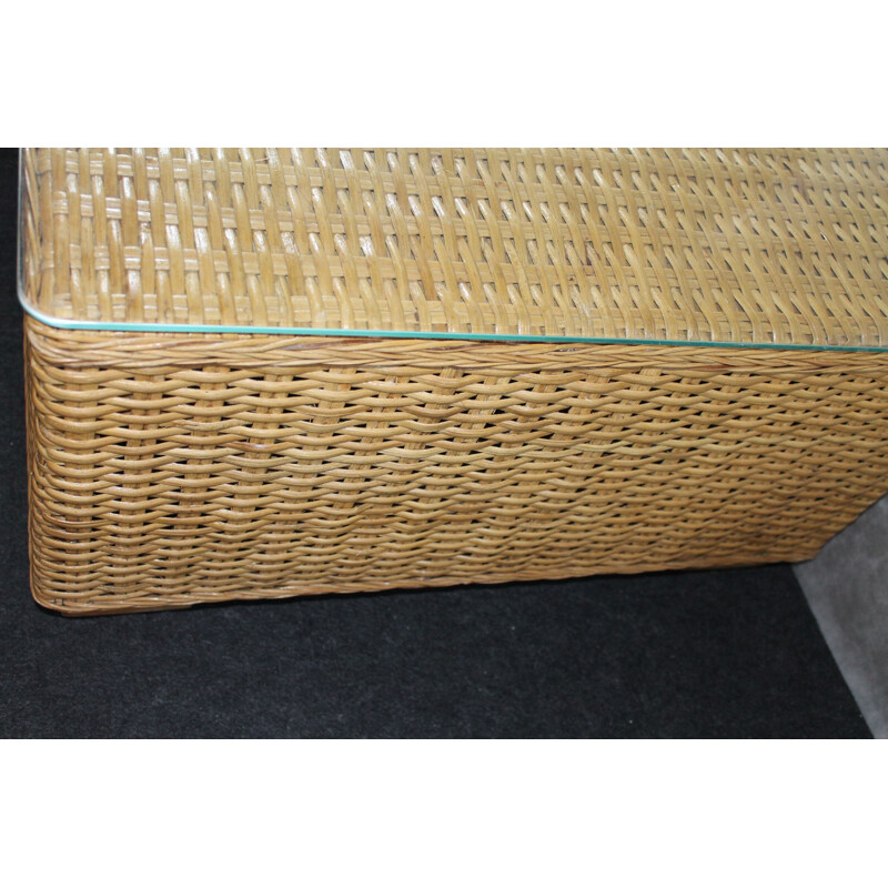 Vintage coffee table made of glass and rattan