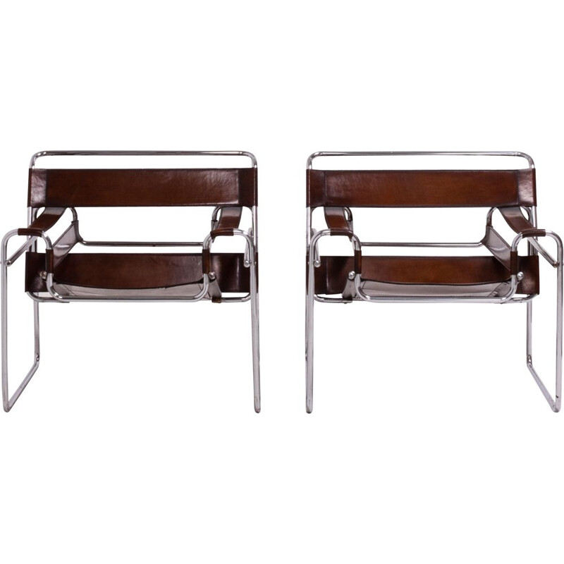 2 chaises en cuir et chrome des années 60