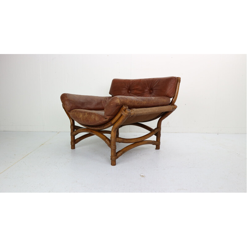 Vintage armchair in brown leather and bamboo