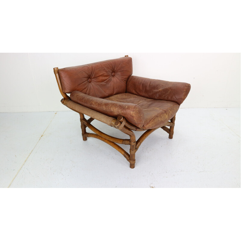 Vintage armchair in brown leather and bamboo